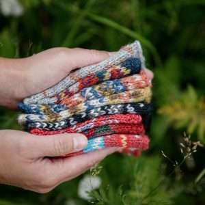 Stack of different coloured fair isle mitts