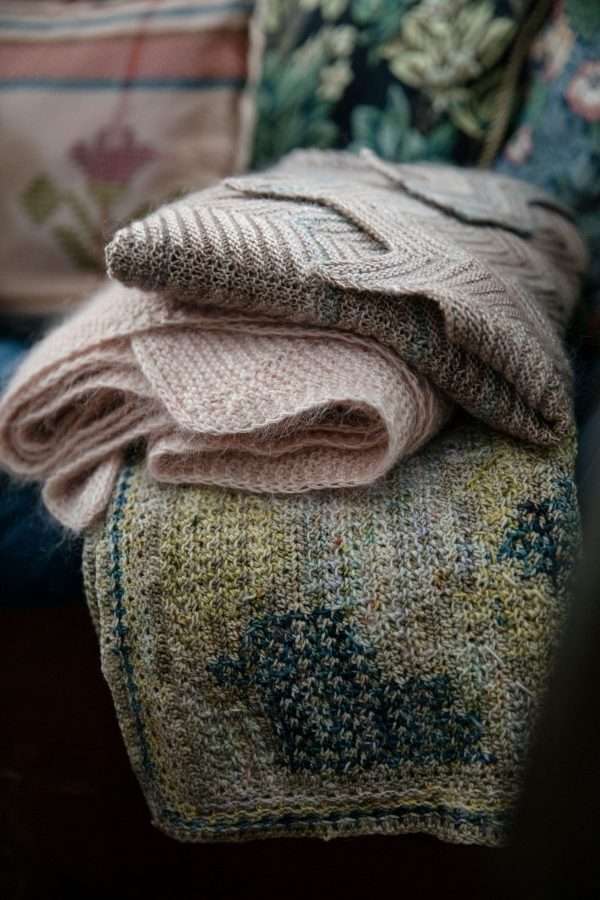 52 Weeks of Shawls | stack of knitwear