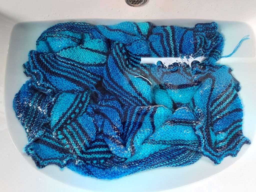 First wet blocking step: soaking shawl