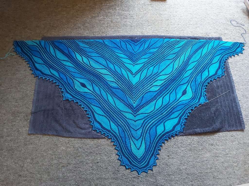 the Moth Papillon shawl pinned out and ready to dry